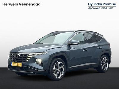 Dark teal metallic (tg8) Gebruikt 2024 Hyundai Tucson Premium SUV | € 36.285 (Eerlijke prijs)