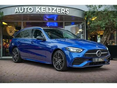 Blauw Occasion 2021 Mercedes C300e AMG line Stationwagen | € 39.900 (Duur)
