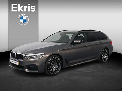 Geel Occasion 2020 BMW 520 Executive Stationwagen | € 35.950 (Duur)