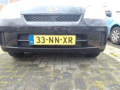Occasion Daihatsu Cuore 58 PK (42 kW) 2004 Zwart Hatchback