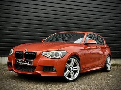 Oranje (metallic) Gebruikt 2014 BMW 116 M Sport Hatchback | € 8.950 (Eerlijke prijs)