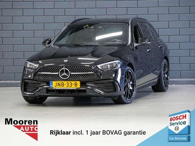 Zwart Occasion 2022 Mercedes C300e AMG line Stationwagen | € 39.950 (Iets duurder)