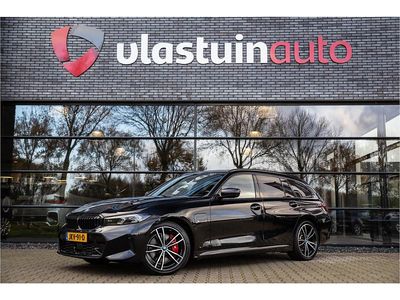 Zwart Occasion 2023 BMW 320 Stationwagen | € 36.900 (Iets duurder)