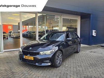 Zwart Occasion 2021 BMW 320e Executive Stationwagen | € 29.450 (Eerlijke prijs)