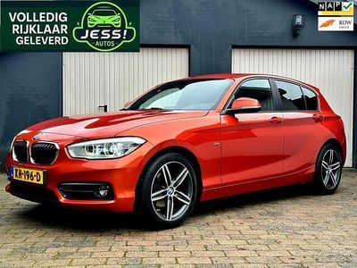 Oranje Occasion 2016 BMW 118 Executive Hatchback | € 15.343 (Eerlijke prijs)