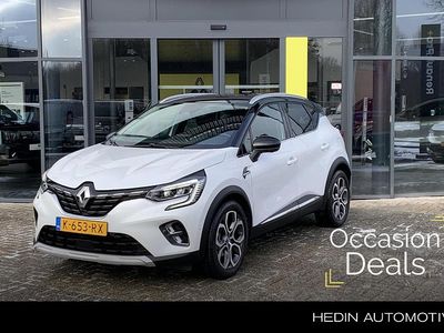 Twotone blanc nacré / noir et Occasion 2021 Renault Captur Edition One SUV | € 19.945 (Goede deal)