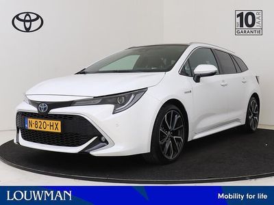 Wit Gebruikt 2021 Toyota Corolla Premium Stationwagen | € 27.450 (Eerlijke prijs)