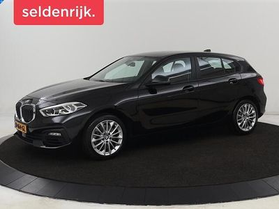 Zwart Gebruikt 2021 BMW 120 Sport Line Hatchback | € 20.900 (Eerlijke prijs)