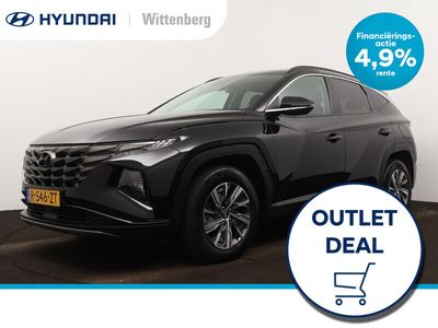 tweedehands Hyundai Tucson 1.6 T-GDI HEV COMFORT SMART | CLIMA | CRUISE | CAMERA | NAVI | LMEVELGEN | PRIVACY GLASS | FABRIEKSGARANTIE GELDIG T/M 2-2028! |