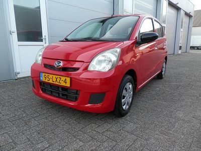 Occasion Daihatsu Cuore 69 PK (50 kW) 2010 Rood Hatchback