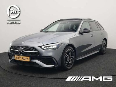 Grijs Gebruikt 2022 Mercedes C300e AMG Stationwagen | € 37.890 (Eerlijke prijs)