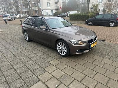 Bruin (metallic) Occasion 2014 BMW 316 Executive Stationwagen | € 4.994 (Eerlijke prijs)