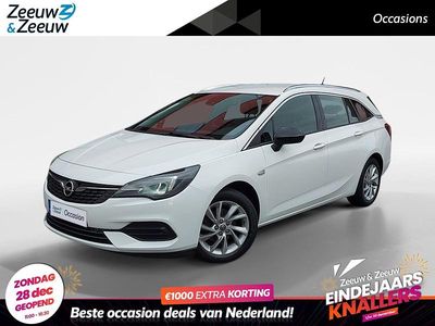 Gaz :summit white s Gebruikt 2021 Opel Astra Business Elegance Stationwagen | € 11.794 (Eerlijke prijs)