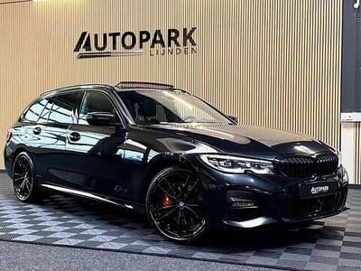 Zwart Gebruikt 2022 BMW 330 Executive Stationwagen | € 25.950 (Goede deal)