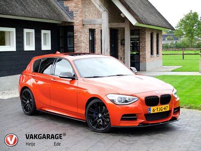Oranje Occasion 2013 BMW M135 Executive Hatchback | € 23.490