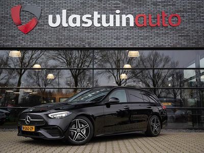 Zwart Occasion 2022 Mercedes C200 AMG line Stationwagen | € 38.950 (Iets duurder)
