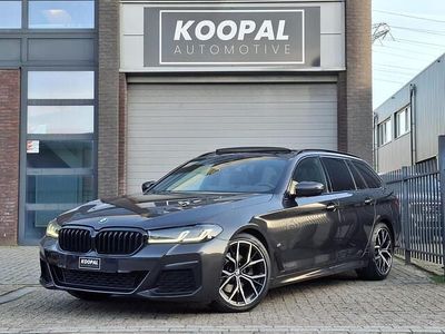 Grijs Occasion 2021 BMW 520 Executive Stationwagen | € 31.440 (Iets duurder)