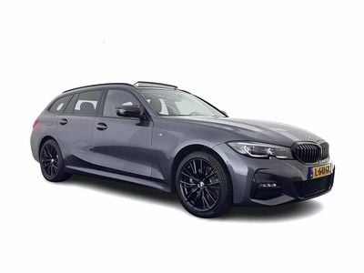 Grijs (metallic) Occasion 2021 BMW 320e Luxury Line Stationwagen | € 19.945 (Duur)