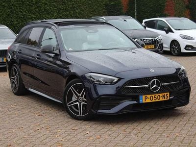 Blauw Gebruikt 2022 Mercedes C300e AMG line Stationwagen | € 35.950 (Goede deal)