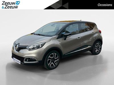 Twotone beige cendré / noir e Gebruikt 2015 Renault Captur Dynamique SUV | € 8.240 (Eerlijke prijs)