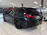 Occasion BMW 330e Basis 292 PK (214 kW) 2024 Zwart Stationwagen