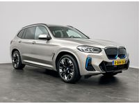 tweedehands BMW iX3 High Executive 74 kWh | wegklapbare trekhaak | Service Inclusive tot 27 April 2026 | Comfort telefoonvoorbereiding met draadloze oplaadmogelijkheid | Head-Up Display | HIFI System Harman Kardon | Dr