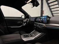 Occasion BMW 330e Executive 291 PK (214 kW) 2022 Blauw Stationwagen