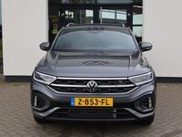 tweedehands VW T-Roc 1.5 TSI R-Line Ergo stoel leder alcantara achteruitrijcamera 18" LMV elektrische achterklep keyless entry en go park assist stoel en stuurwiel verwarming privacy glas LED Plus koplampen carplay navigatie draadloos