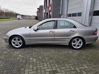 tweedehands Mercedes C200 K. Elegance Yongtimer| cruise| navigatie| scherm