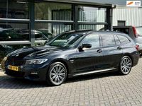 Occasion BMW 330e Executive 292 PK (214 kW) 2022 Zwart Stationwagen