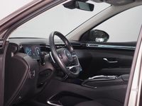 tweedehands Hyundai Tucson 1.6 T-GDI HEV Comfort | Panoramadak | Noodremassistent | Highway Driving Assist | Stuurwiel- en Voor- en achterstoelen verwarmd | Achteruitrijcamera | Parkeersensoren | Apple CarPlay/ Android Auto | Draadloze tele