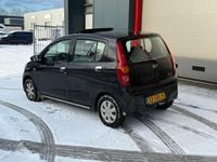 Occasion Daihatsu Cuore 69 PK (50 kW) 2008 Zwart Hatchback