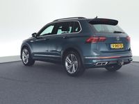 tweedehands VW Tiguan 1.5 TSI 150pk DSG 2x R-Line Trekhaak IQ.Light Stoelverwarming Parkassist Virtual Cockpit Navigatie