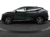 tweedehands Nissan Ariya Evolve 91 kWh | Aurora Green | 20" Lichtmetalen velgen | Alcantara bekleding | Voorstoel verkoel en verwarmbaar | Rondomzicht camera |