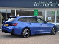 Occasion BMW 330e Basis 292 PK (214 kW) 2024 Blauw Stationwagen