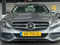 tweedehands Mercedes C200 Ambition navigatie clima cruise controle lm-velgen pdc xenon stoelverwarming dealer onderhouden