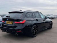 Occasion BMW 320e Sport Line 204 PK (150 kW) 2021 Zwart Stationwagen