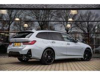 Occasion BMW 330 293 PK (215 kW) 2023 Grijs Stationwagen