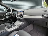 tweedehands BMW 330e 3-serie TouringSportline Plug In Hybrid PHEV | Adaptive Cruise | Trekhaak af Fabriek | Lice Cockpit | Apple Carplay | Camera | Stoelverwarming |