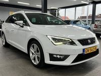 tweedehands Seat Leon ST 2.0 TDI FR Connect navigatie climate controle camera half leer lm-velgen cruise pdc v+a trekhaak led vol auto