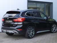 tweedehands BMW X1 sDrive20i Orange Edition III / Panorama / Trekhaak