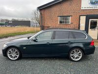 tweedehands BMW 330 3-SERIE Touring xi ( Climate control + Navigatie + Stoelverwarming )