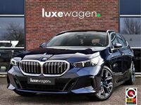 Occasion BMW i5 M Sport 289 kW (394 PK) 2024 Blauw Stationwagen