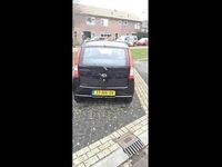 Occasion Daihatsu Cuore 58 PK (42 kW) 2004 Zwart Hatchback