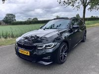 Occasion BMW 330e Executive 184 PK (135 kW) 2022 Zwart Stationwagen