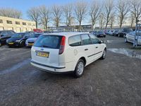 tweedehands Ford Focus Wagon 1.4-16V Ambiente Goed rijdende en ruime gezinsauto,Airco,Electr pakket,Apk 17-02-2024.