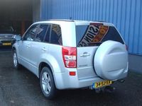 tweedehands Suzuki Grand Vitara 2.0-16V Exclusive - 4 X 4 - LM Velgen - Metalic lak - Airco - 4 Elec. ramen - 2 sleutels - Centrale deurvergrendeling - Trekhaak