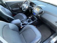 tweedehands Hyundai ix35 1.6i GDI Go! / Navigatie / Verwarmde stoelen voor + achter / Half lederen interieur / LMV / 1ste Eigenaarsauto