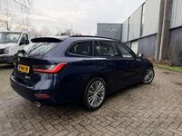 Occasion BMW 330e 184 PK (135 kW) 2021 Blauw Stationwagen