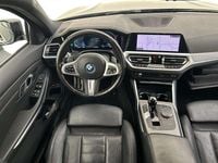 Occasion BMW 320e M Sport 163 PK (119 kW) 2022 Zwart Stationwagen